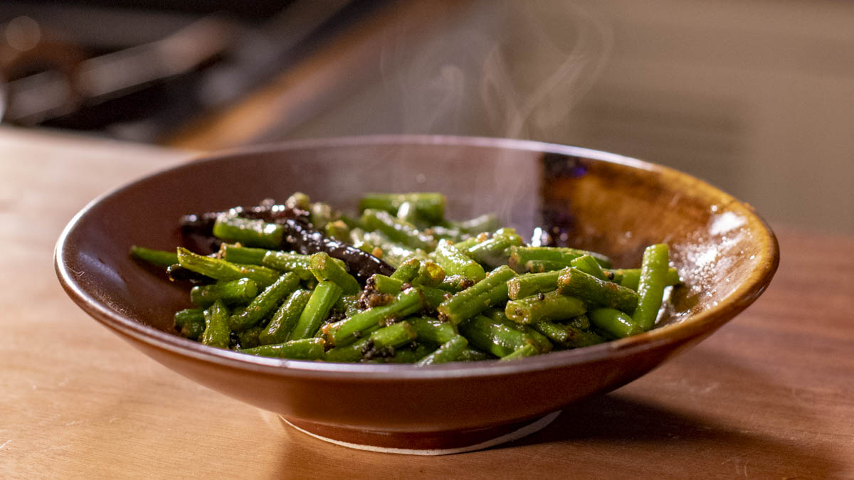 Bengali Beans. Make these flavor-packed Bengali beans, the perfect fiery side dish to the mild and floral chicken korma, or to eat any day of the week.