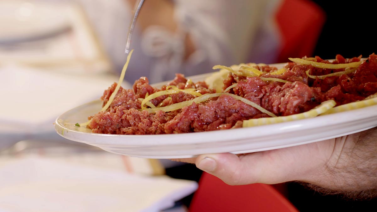 Sushi Del Chianti - Chianti Sushi. Beef tartare, Dario's way. The red lean beef is tenderized and seasoned with extra-virgin olive oil, lemon, and spices. The result? Chianti Sushi.