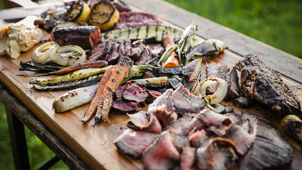 Open Fire Grilled Steaks & Vegetables with Kalbi Butter.