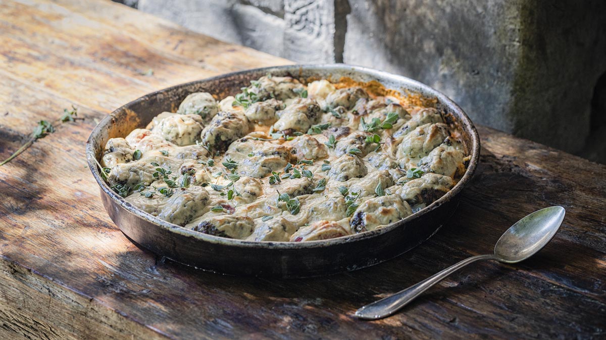 Siniya. Erez fires up his Taboon oven to create a traditional Lebanese dish named for the pan it's roasted in, with lamb kebabs, tomatoes, and raw tahini.